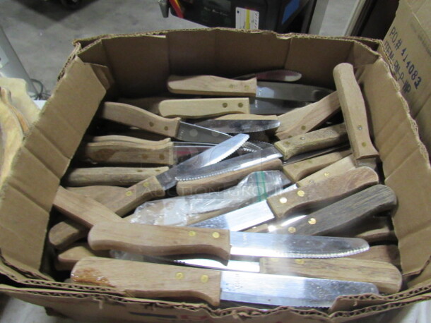 One Mega Lot Of NEW Steak Knives.