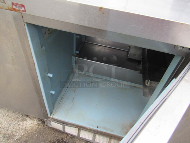 One 3 Door Manitowic Prep Table On Casters. Model# 4472N-18M-14N. 115 Volt. 72X32X45. - Image 2 of 2