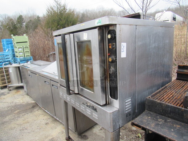 One Blodgett Natural Gas Full Size Convection Oven, With 4 Racks, On Casters. #04046R70075. 38X40X62 - Image 2 of 3