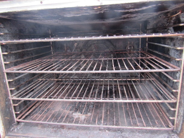 One Blodgett Natural Gas Full Size Convection Oven, With 4 Racks, On Casters. #04046R70075. 38X40X62 - Image 3 of 3