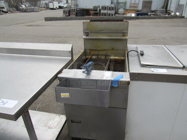 One SS Pitco Natural Gas Deep Fryer With 2 Baskets On Casters. 19.5X42X45.5