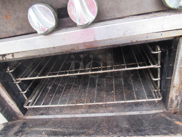 One Vulcan Natural Gas 6 Burner Range, With 2 Racks. 36X37X36 - Image 2 of 3