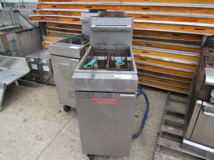 One Vulcan Natural Gas 40lb Deep Fryer, With 2 Baskets, On Casters. Model# LG300. 16X30X47