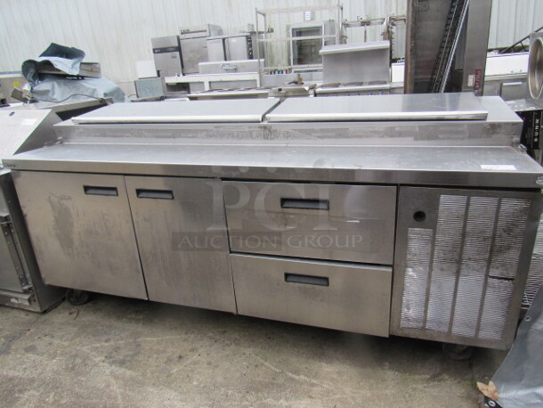 One Delfield 2 Door/2 Drawer Refrigerated Prep Table On Casters. 91X32X42 Tested And Working!!!! COLD COLD COLD!!! - Image 1 of 2
