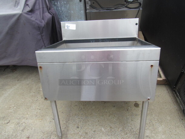 One Stainless Steel Glas Tender Ice Well With Back Splash. Different size legs for Front And Back. 30X34X36.