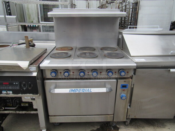 One Imperial 6 Burner Induction Range, With Stainless Steel Over Shelf, And 1 Rack, On Casters. 36X34X58