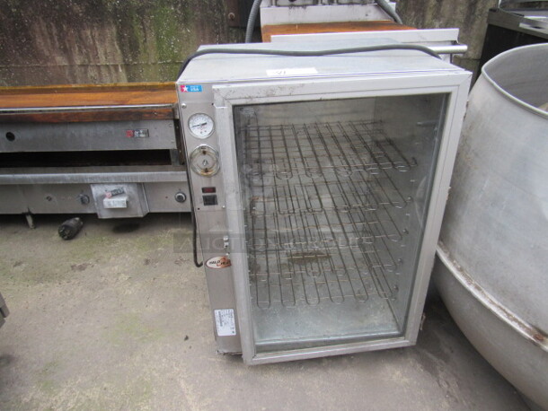 One Alto Sham Halo Heat Holding Cabinet On Casters. Model# 500-PH/GD. 120 Volt. 1,000 Watt. 22.5X21X34 - Image 1 of 1