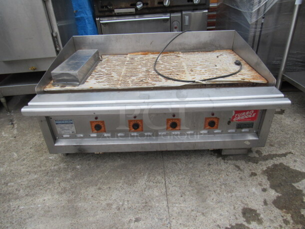 One Rankin Deluxe Infrared Gas Turbo Griddle. Model# RD-100-48. 48X34X24. 