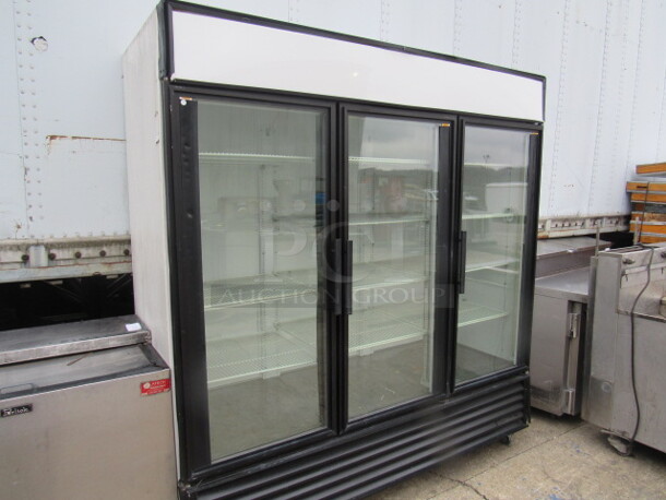 COLD COLD COLD!!! One True 3 Door Glass Lighted Display Cooler With 11 Racks.  Model# GDM-72. 115 Volt. 77X30X83. Working And Cold. - Image 2 of 2