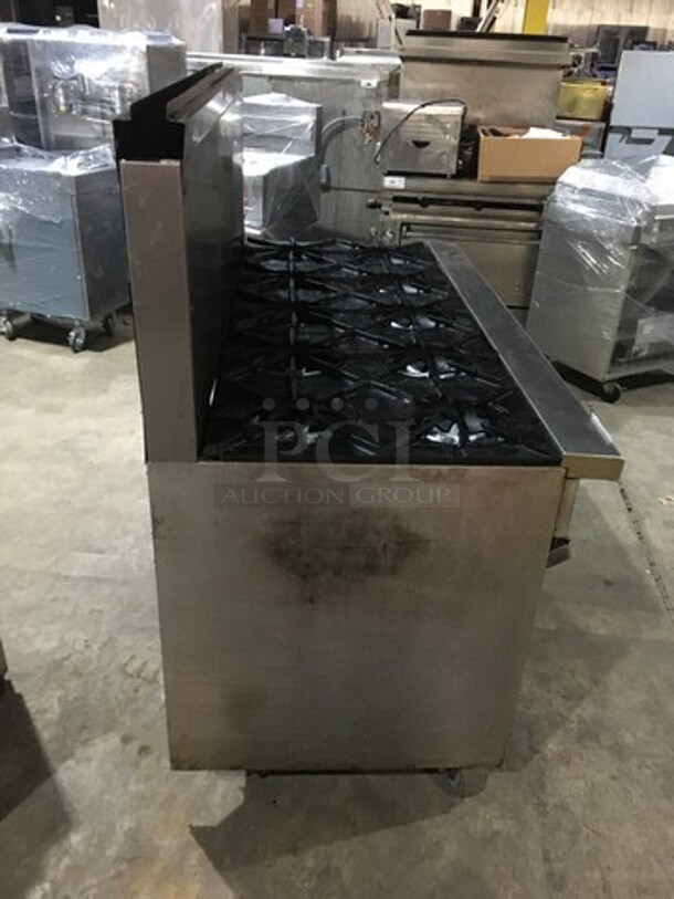 All Stainless Steel Natural Gas Powered 10 Burner Stove! With 2 Full Size Ovens Underneath! With Backsplash! On Commercial Casters! - Image 4 of 10