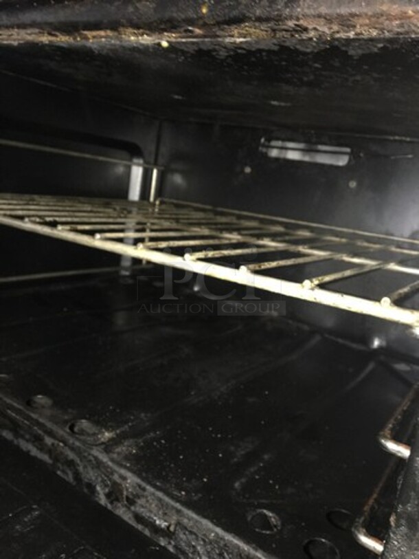 All Stainless Steel Natural Gas Powered 10 Burner Stove! With 2 Full Size Ovens Underneath! With Backsplash! On Commercial Casters! - Image 8 of 10