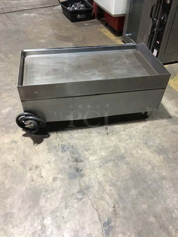 APW Wyott Commercial Countertop Electric Powered Flat Griddle! With Back & Side Splashes! All Stainless Steel! Model EG36I Serial 120871307015! 208/240V 1/3 Phase! On Legs!
 - Image 3 of 8