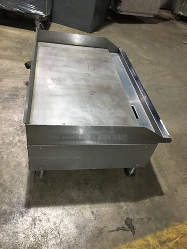 APW Wyott Commercial Countertop Electric Powered Flat Griddle! With Back & Side Splashes! All Stainless Steel! Model EG36I Serial 120871307015! 208/240V 1/3 Phase! On Legs!
 - Image 4 of 8