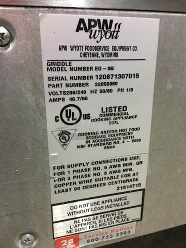 APW Wyott Commercial Countertop Electric Powered Flat Griddle! With Back & Side Splashes! All Stainless Steel! Model EG36I Serial 120871307015! 208/240V 1/3 Phase! On Legs!
 - Image 7 of 8