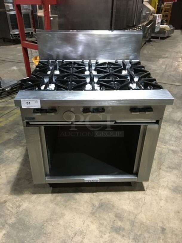 Garland Commercial Natural Gas Powered 6 Burner Stove! With Storage Space Underneath! With Backsplash! All Stainless Steel! Model U366S Serial 1501100101834! On Commercial Casters!
