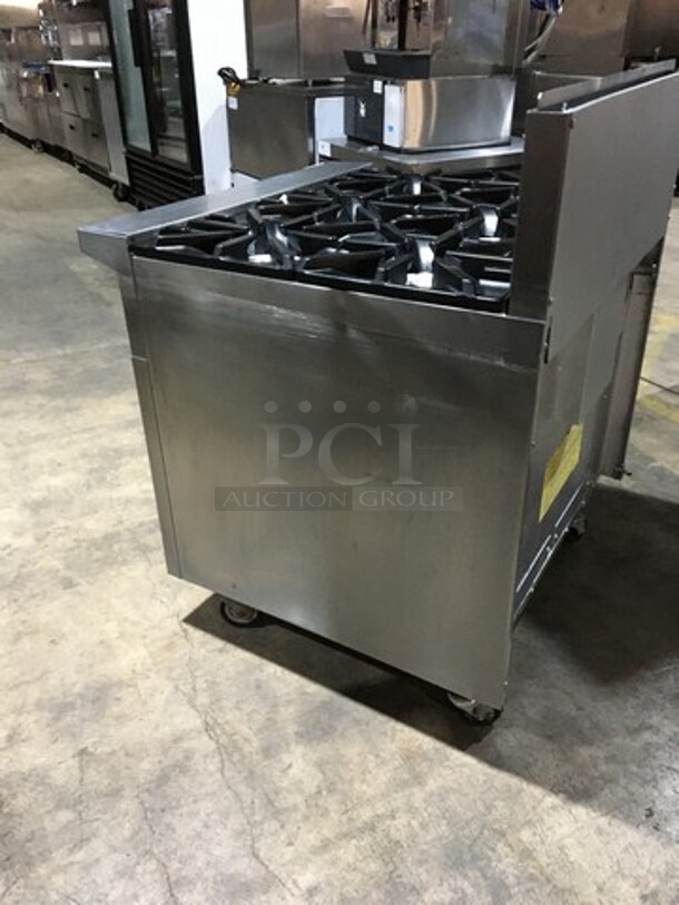 Garland Commercial Natural Gas Powered 6 Burner Stove! With Storage Space Underneath! With Backsplash! All Stainless Steel! Model U366S Serial 1501100101834! On Commercial Casters!
 - Image 4 of 11