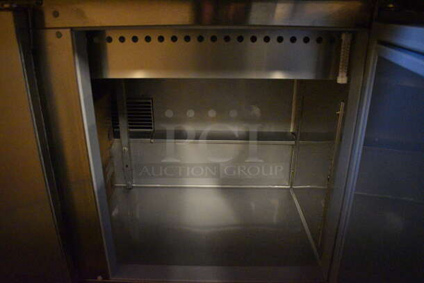 BRAND NEW! Beverage Air Model SPE72-12M Stainless Steel Commercial Sandwich Salad Prep Table Bain Marie Mega Top w/ 12 BRAND NEW IN BOX Vollrath 1/6 Size Drop In Bins and 4 BRAND NEW IN BOX Commercial Casters. Unit Is Missing Mega Top Lid. 115 Volts, 1 Phase. 72x36.5x31. Tested and Working! - Image 9 of 12