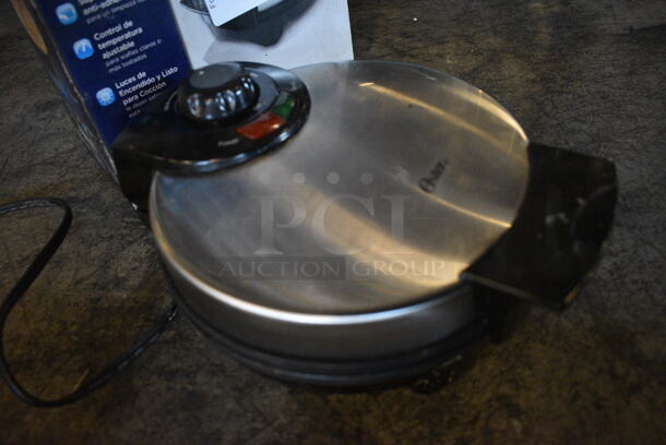 IN ORIGINAL BOX! Oster Countertop Waffle Maker. 7.5x9.5x4.5 - Image 2 of 4