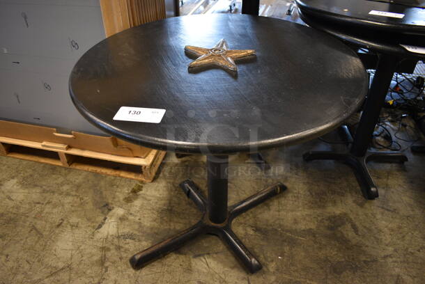 Black Round Table on Black Metal Table Base. 32x32x29