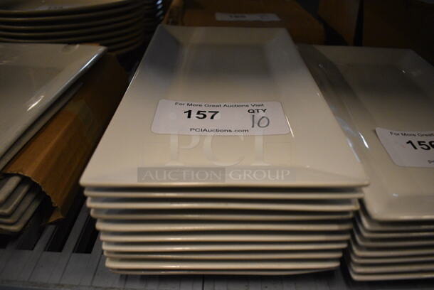 10 White Ceramic Plates. 11.5x6.5x1. 10 Times Your Bid!
