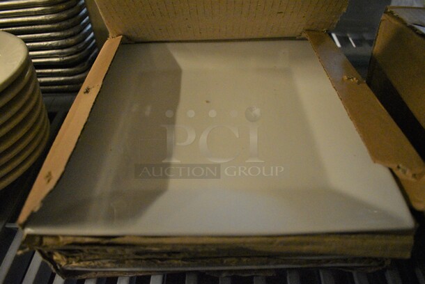 6 BRAND NEW IN BOX! White Ceramic Plates. 9x9x1. 6 Times Your Bid!