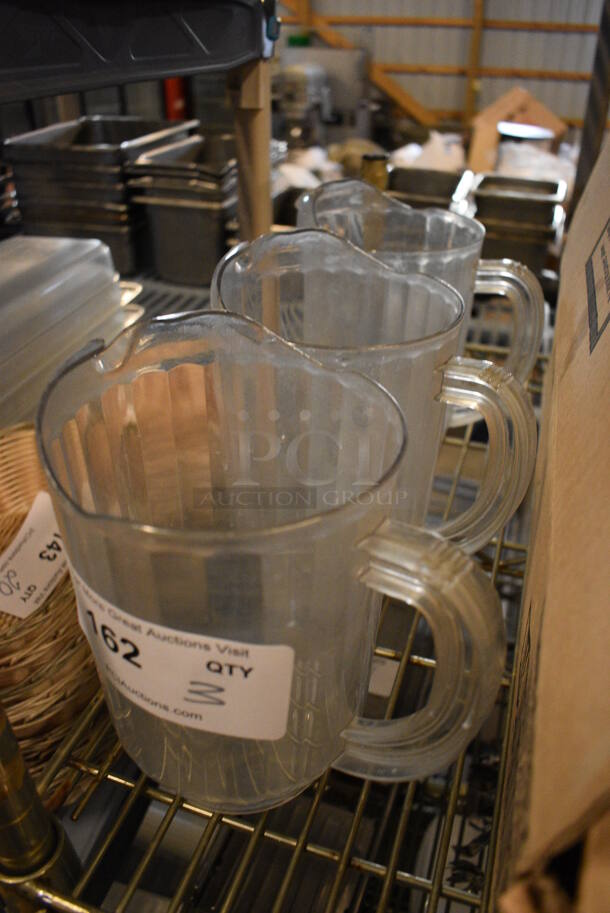 3 Clear Poly Pitchers. 7x5x8. 3 Times Your Bid! - Image 2 of 2