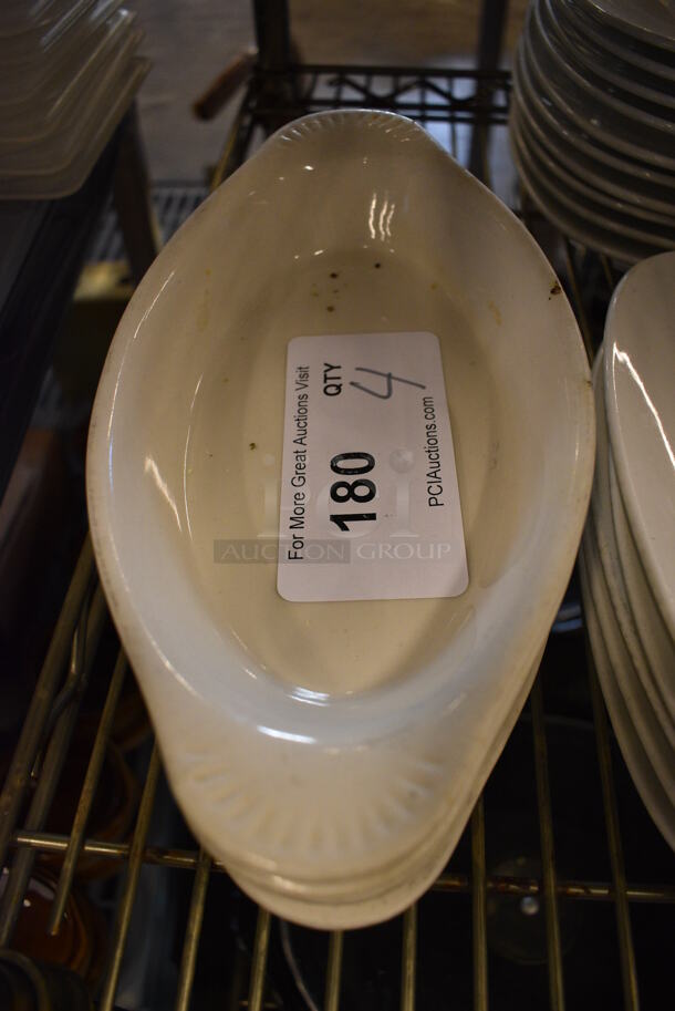 4 White Ceramic Single Serving Casserole Dishes. 10.5x5.5x1.5. 4 Times Your Bid!