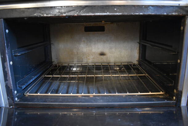 WOW! American Range Stainless Steel Commercial Gas Powered 6 Burner Range w/ Lower Oven and Stainless Steel Overshelf on Commercial Casters. 36x33x57 - Image 5 of 7