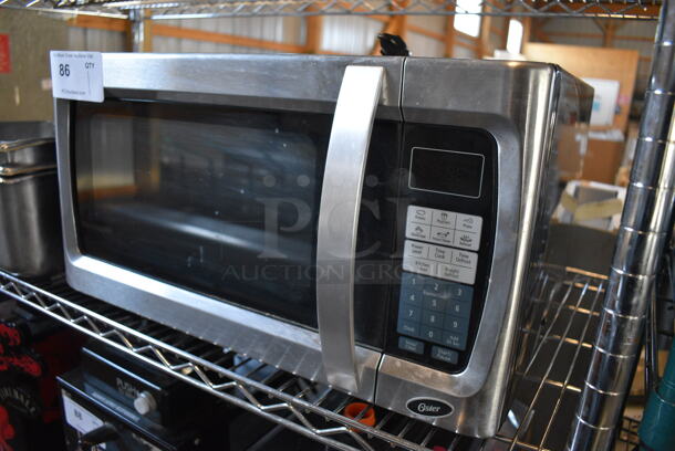 Oster Stainless Steel Countertop Microwave Oven. 21x18x12 - Image 3 of 5