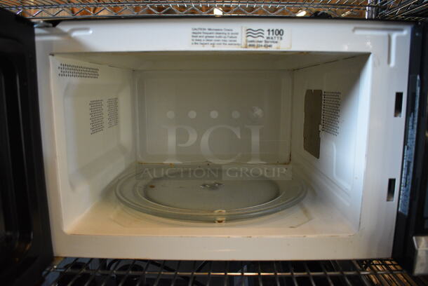 Oster Stainless Steel Countertop Microwave Oven. 21x18x12 - Image 5 of 5