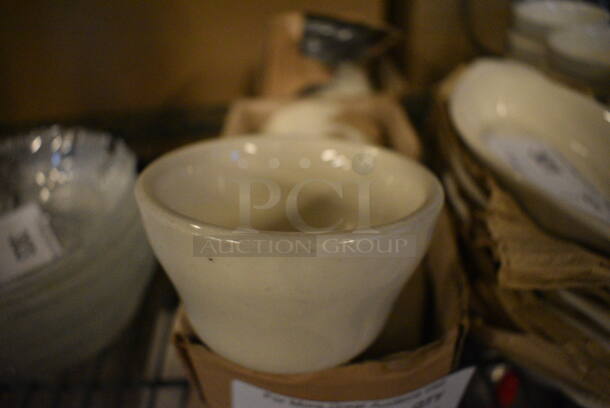 12 BRAND NEW IN BOX! White Ceramic Bowls. 4x4x2.5. 12 Times Your Bid!