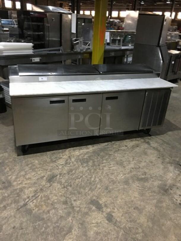 Delfield Commercial Refrigerated Marble Top Pizza Prep Table! With 3 Door Underneath Storage Space! All Stainless Steel! Model 1861PTBM Serial 112642903M! On Casters!