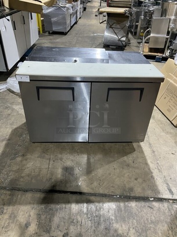 True Commercial Refrigerated Sandwich Prep Table! With 2 Door Underneath Storage Space! All Stainless Steel! With Commercial Cutting Board! Model TSSU4808 Serial 7320707! 115V 1Phase! On Commercial Casters!