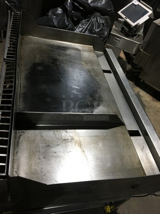 Woodstone Commercial Natural Gas Powered 48 Inch Flat Griddle! With Split Top! With Back & Side Splashes! With Underneath Storage Space! All Stainless Steel Equipment Stand On Commercial Casters! - Image 5 of 12