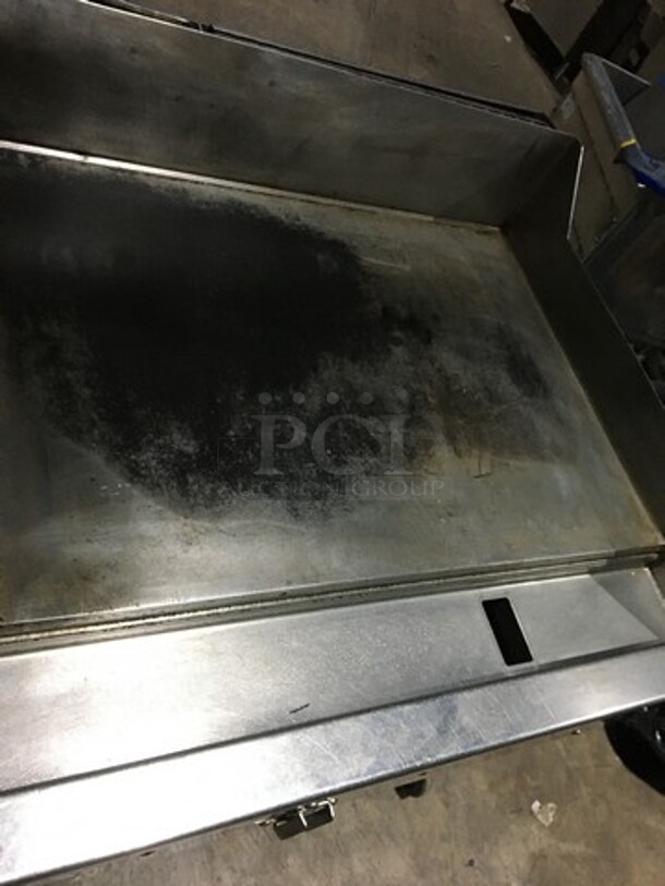 Woodstone Commercial Natural Gas Powered 48 Inch Flat Griddle! With Split Top! With Back & Side Splashes! With Underneath Storage Space! All Stainless Steel Equipment Stand On Commercial Casters! - Image 7 of 12