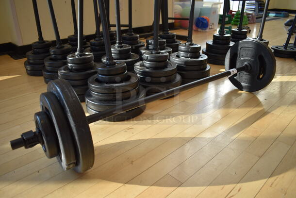 6 Les Mills Body Pump Weight Plates w/ Body Pump Bar; Two 2.2 Pound, Two 5.5 Pound, Two 11 Pound. This Lot Is One Complete Set of 6 Weights and 1 Bar. Does Not Come Put Together. Stock Picture - Cosmetic Condition May Vary. 52" BUYER MUST REMOVE. 6 Times Your Bid! (aerobic room) - Image 1 of 9