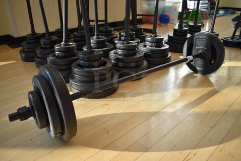 6 Les Mills Body Pump Weight Plates w/ Body Pump Bar; Two 2.2 Pound, Two 5.5 Pound, Two 11 Pound. This Lot Is One Complete Set of 6 Weights and 1 Bar. Does Not Come Put Together. Stock Picture - Cosmetic Condition May Vary. 52" BUYER MUST REMOVE. 6 Times Your Bid! (aerobic room)