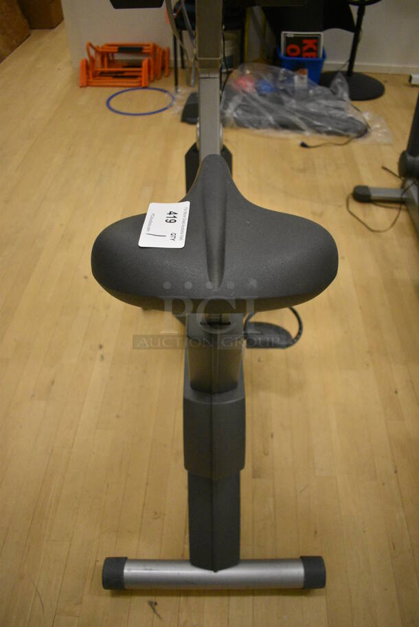 Life Fitness Metal Commercial Floor Style Upright Stationary Bicycle w/ Life Fitness Monitor. BUYER MUST REMOVE. 24x48x63. Working Condition Is Not Known. (behind squash court - right) - Image 3 of 7