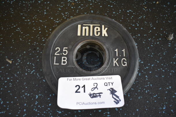 2 Intek Metal 2.5 Pound Weight Plates. BUYER MUST REMOVE. 6.5x6.5x1. 2 Times Your Bid! (upstairs)