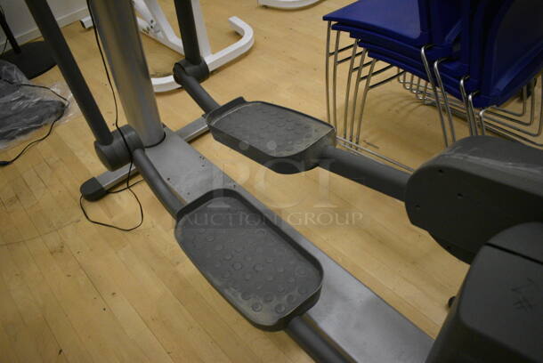Life Fitness Model 95xi Metal Commercial Floor Style Elliptical Cross Trainer w/ Life Fitness Monitor. BUYER MUST REMOVE. 32x82x74. Working Condition Is Not Known. (behind squash court - right) - Image 4 of 9