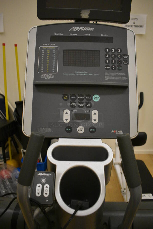 Life Fitness Model 95xi Metal Commercial Floor Style Elliptical Cross Trainer w/ Life Fitness Monitor. BUYER MUST REMOVE. 32x82x74. Working Condition Is Not Known. (behind squash court - right) - Image 6 of 9