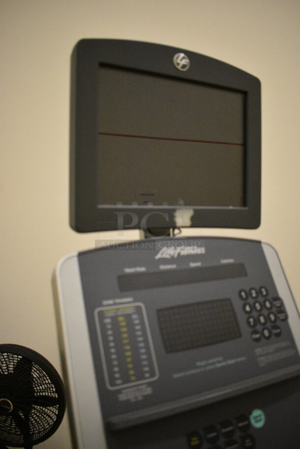 Life Fitness Model 95xi Metal Commercial Floor Style Elliptical Cross Trainer w/ Life Fitness Monitor. BUYER MUST REMOVE. 32x82x74. Working Condition Is Not Known. (behind squash court - right) - Image 7 of 9