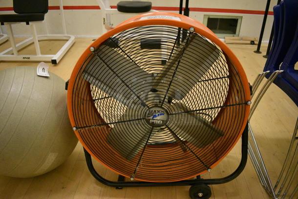 Maxx Air Pro Orange Metal Floor Style Fan. 30x12x30. (behind squash court - right)