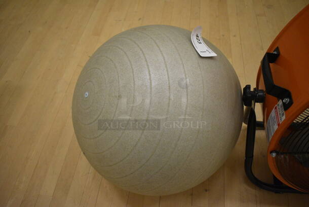Gray Stability Ball. 18x18x18. (behind squash court - right)