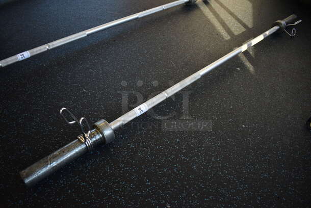 Aluminum Olympic Training Bar w/ 2 Spring Collars. 72". (upstairs) - Image 1 of 3