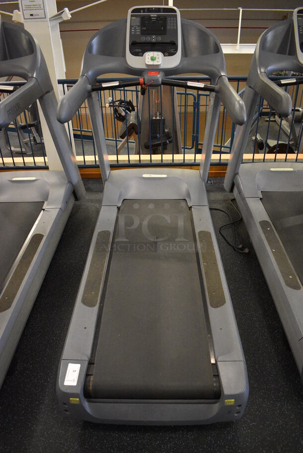NICE! Precor Model C966i Metal Heavy Duty Commercial Floor Style Treadmill w/ Entertainment Controls and Heart Rate Sensors. Belt Has a Tear - See Pictures. BUYER MUST REMOVE. 120 Volts, 1 Phase. 35x87x66. Tested and Working! (upstairs) This Unit Will Be Moved Down To The First Floor Before Pick Up Day Begins!