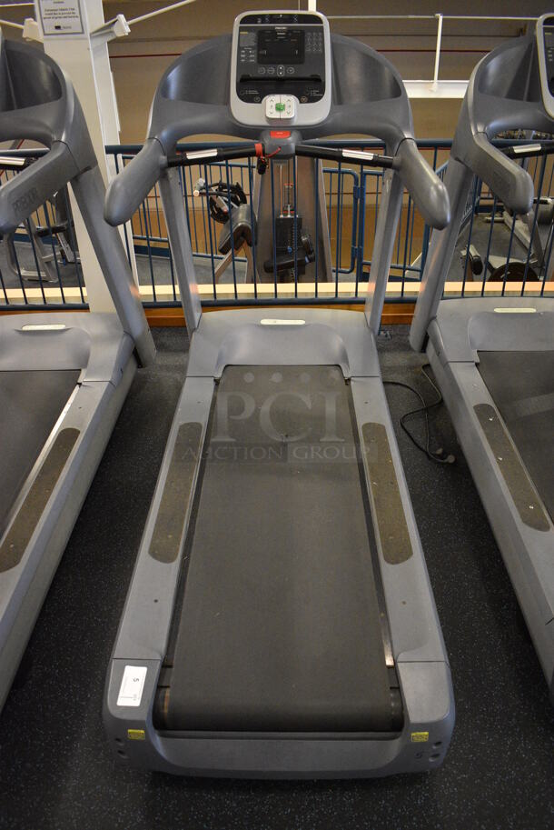 NICE! Precor Model C966i Metal Heavy Duty Commercial Floor Style Treadmill w/ Entertainment Controls and Heart Rate Sensors. Belt Has a Tear - See Pictures. BUYER MUST REMOVE. 120 Volts, 1 Phase. 35x87x66. Tested and Working! (upstairs) This Unit Will Be Moved Down To The First Floor Before Pick Up Day Begins! - Image 1 of 9