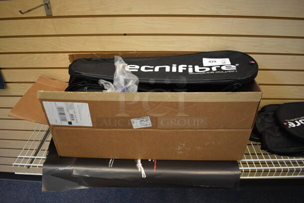 ALL ONE MONEY! Lot of Squash Racket Cases and Tshirts on White Rack! BUYER MUST REMOVE. (lobby - front room to the side) - Image 2 of 6