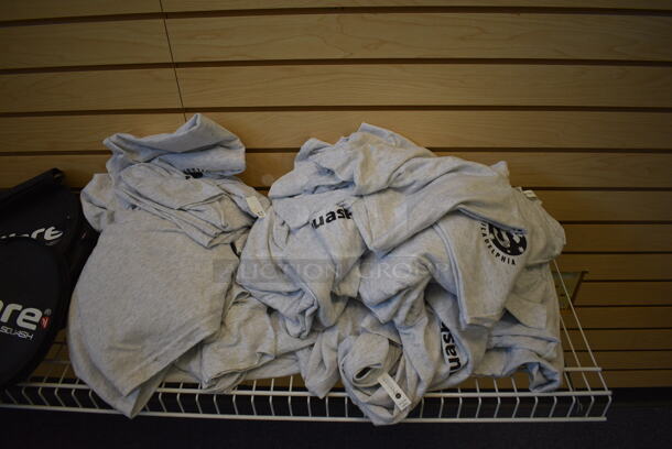 ALL ONE MONEY! Lot of Squash Racket Cases and Tshirts on White Rack! BUYER MUST REMOVE. (lobby - front room to the side) - Image 4 of 6