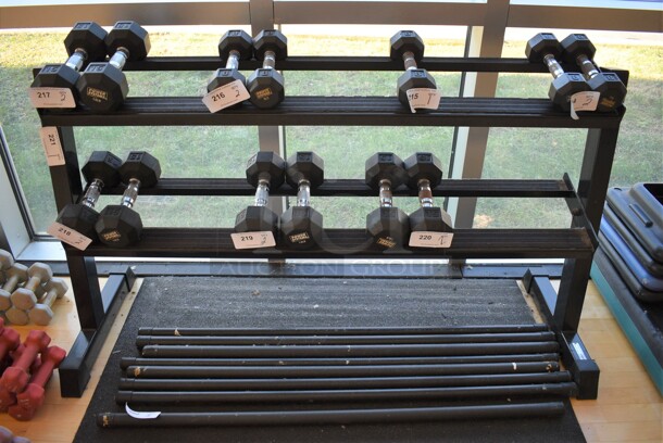 Black Metal 2 Tier Dumbbell Rack. Does Not Include Contents. BUYER MUST REMOVE. 58x21x32. (aerobic room)